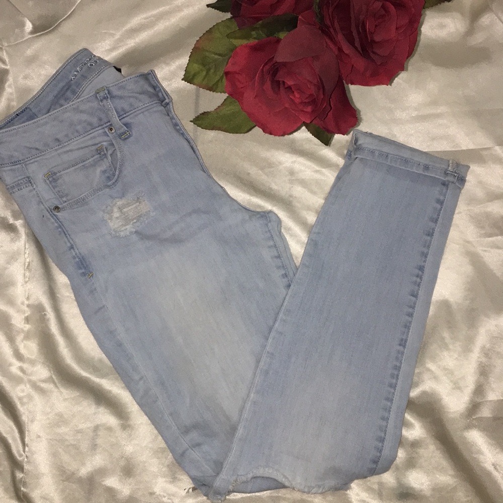 AEO light wash distressed super stretch jeans